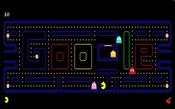 Google Pac-Man Doodle at the start of a round with full maze of dots and ghosts in ghost house