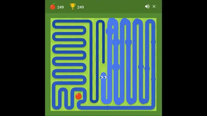 Google Snake late game showing long snake taking up most of the grid with little room left