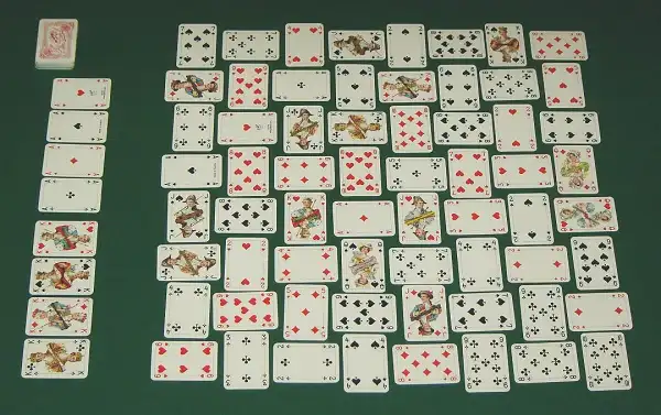 What Is Google Solitaire? History of the Google Doodle Card Game Historical illustration of a patience card game being played in the 19th century
